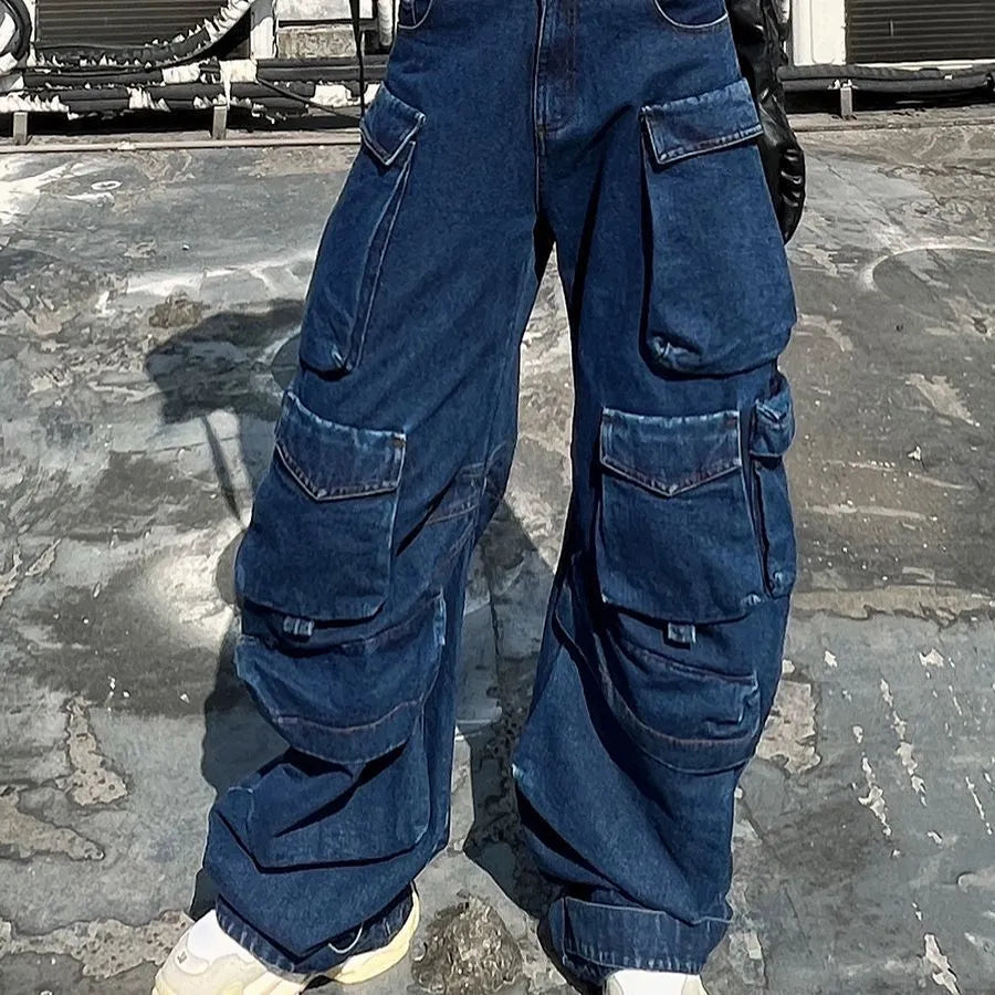 Dark blue distressed wide-leg jeans with high waist and multiple pockets on mannequin