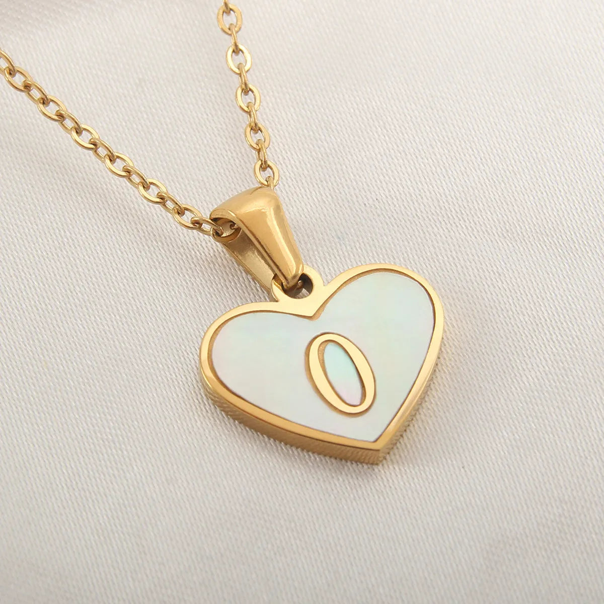 Gold plated personalised heart necklace with white shell on a 45cm chain