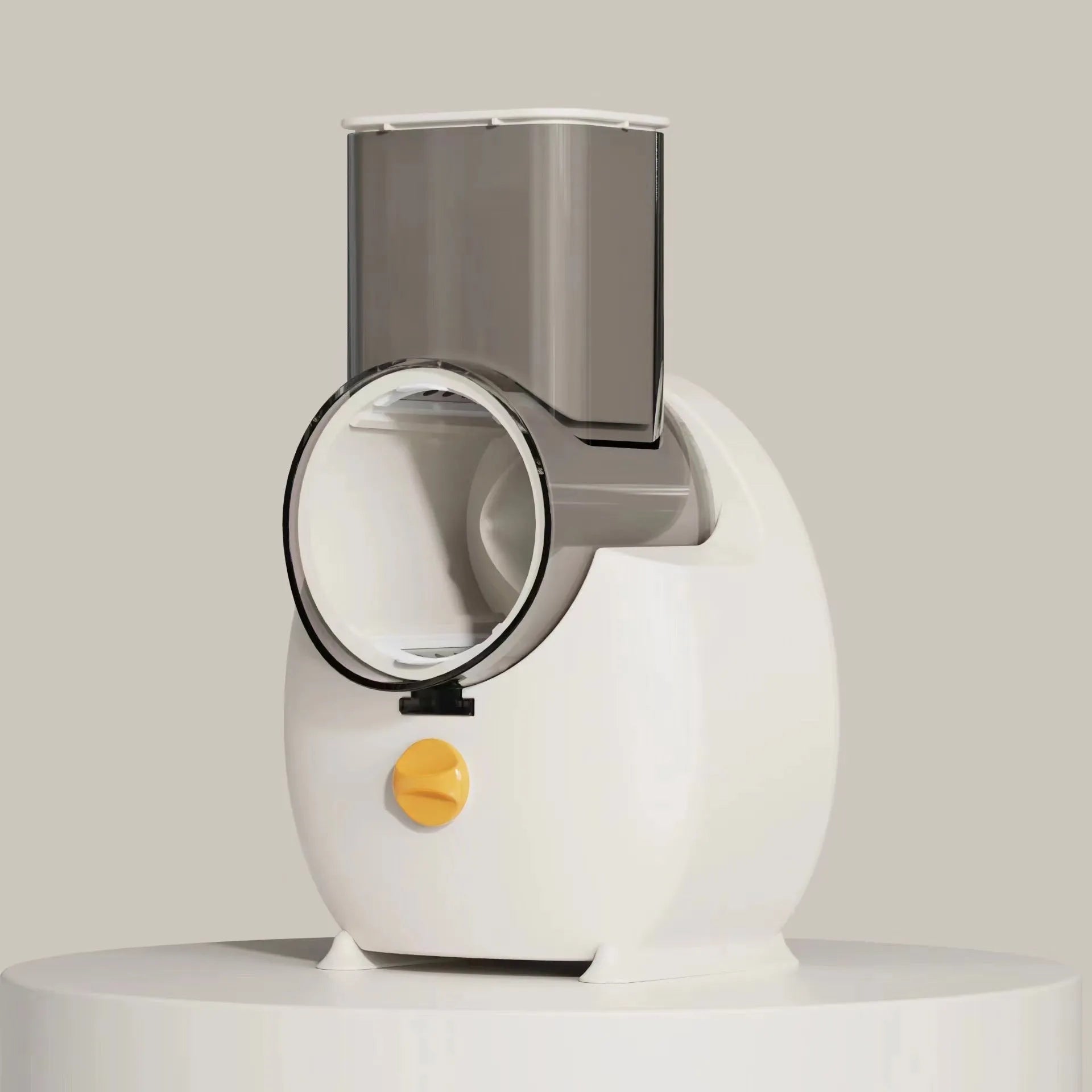 White electric vegetable slicer with rotary grater, three blades, and suction base on kitchen counter