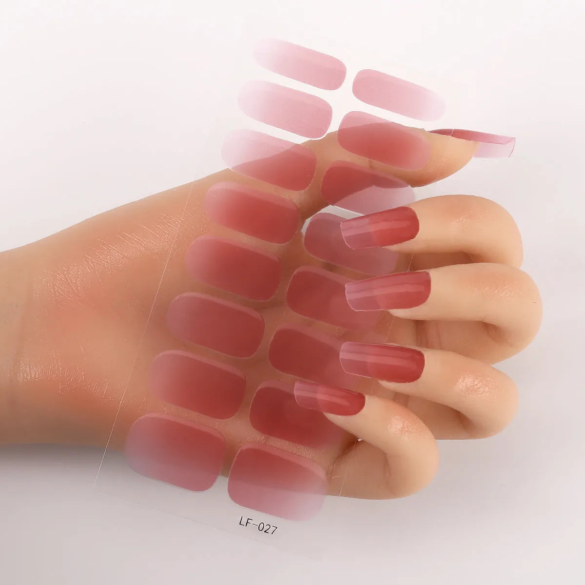 Full nail art sticker sheet showing 16 different solid colour designs including European simple nails and floral patterns
