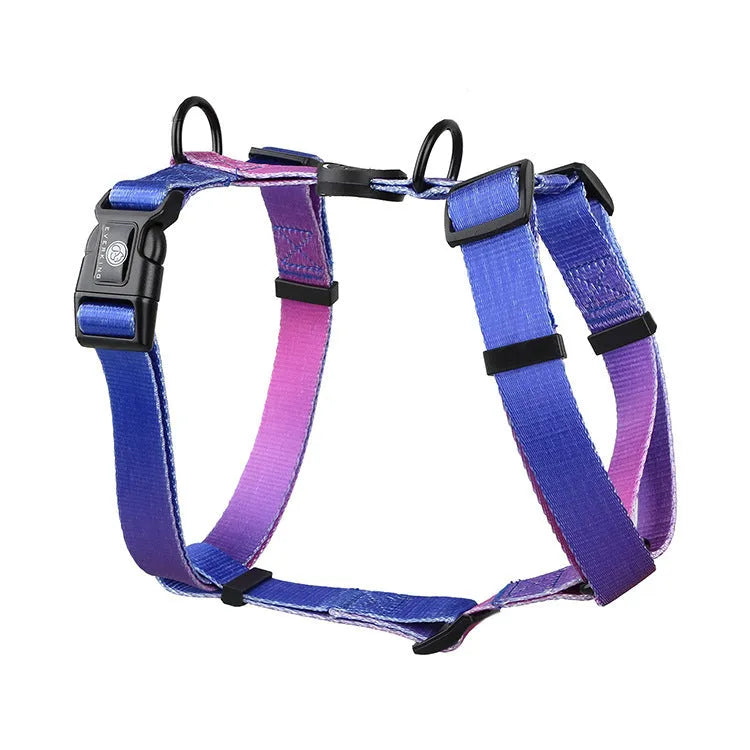 Polyester dog harness with chest strap in a gradient colour print, shown in S, M, L sizes.