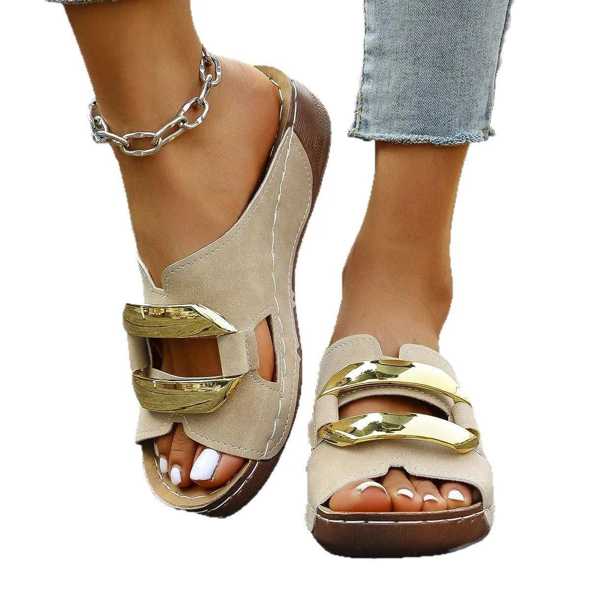 White Roman style platform sandals with flat heel and metal detail on a rubber sole.