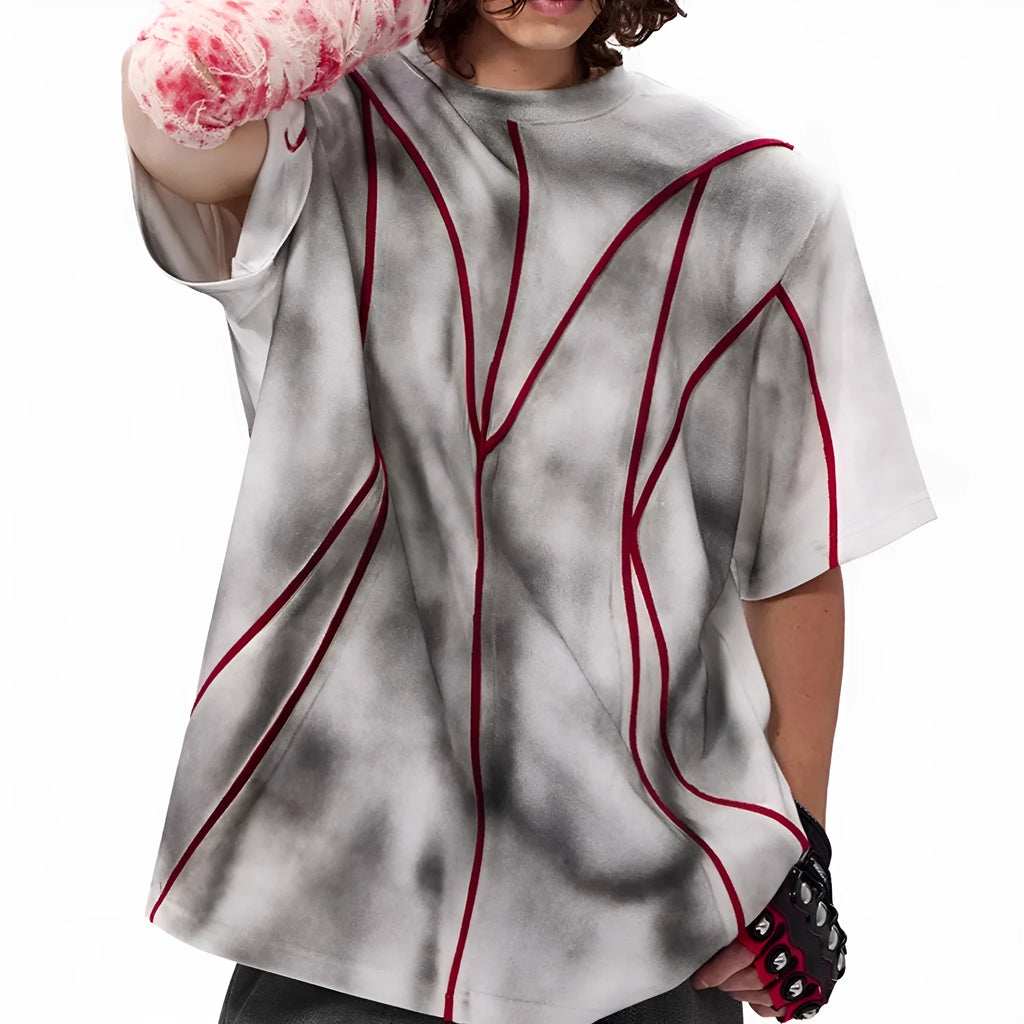 Women's short sleeve t-shirt with padded shoulders and raised line patchwork design on a round neck.