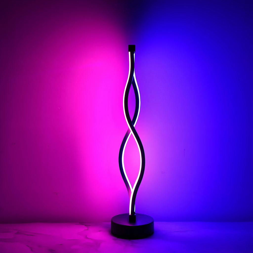 Black aluminium desk lamp with a touch dimming button for blue, pink, and warm white light.