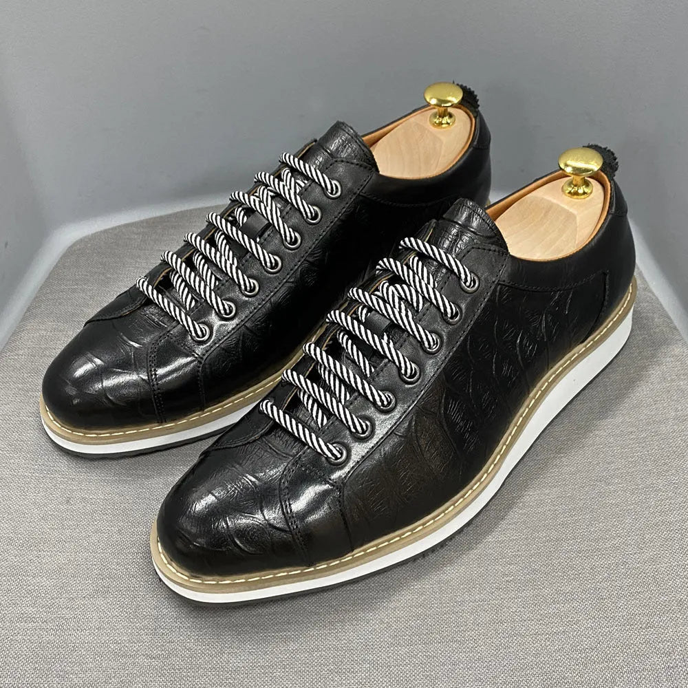 Men's handmade embossed pattern low-top casual shoes in green with front tie laces.