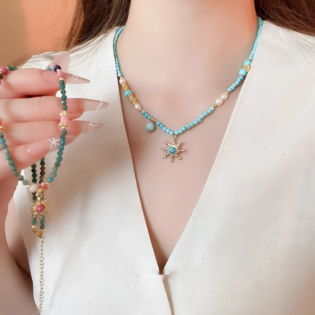 Stone freshwater pearl sun necklace with French royal style pendant on adjustable clavicle chain