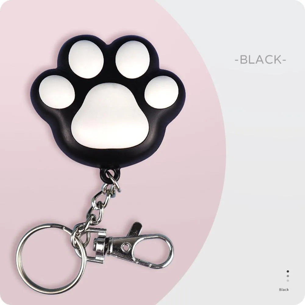 Pink and black USB-rechargeable infrared laser cat teaser toy with keychain loop.