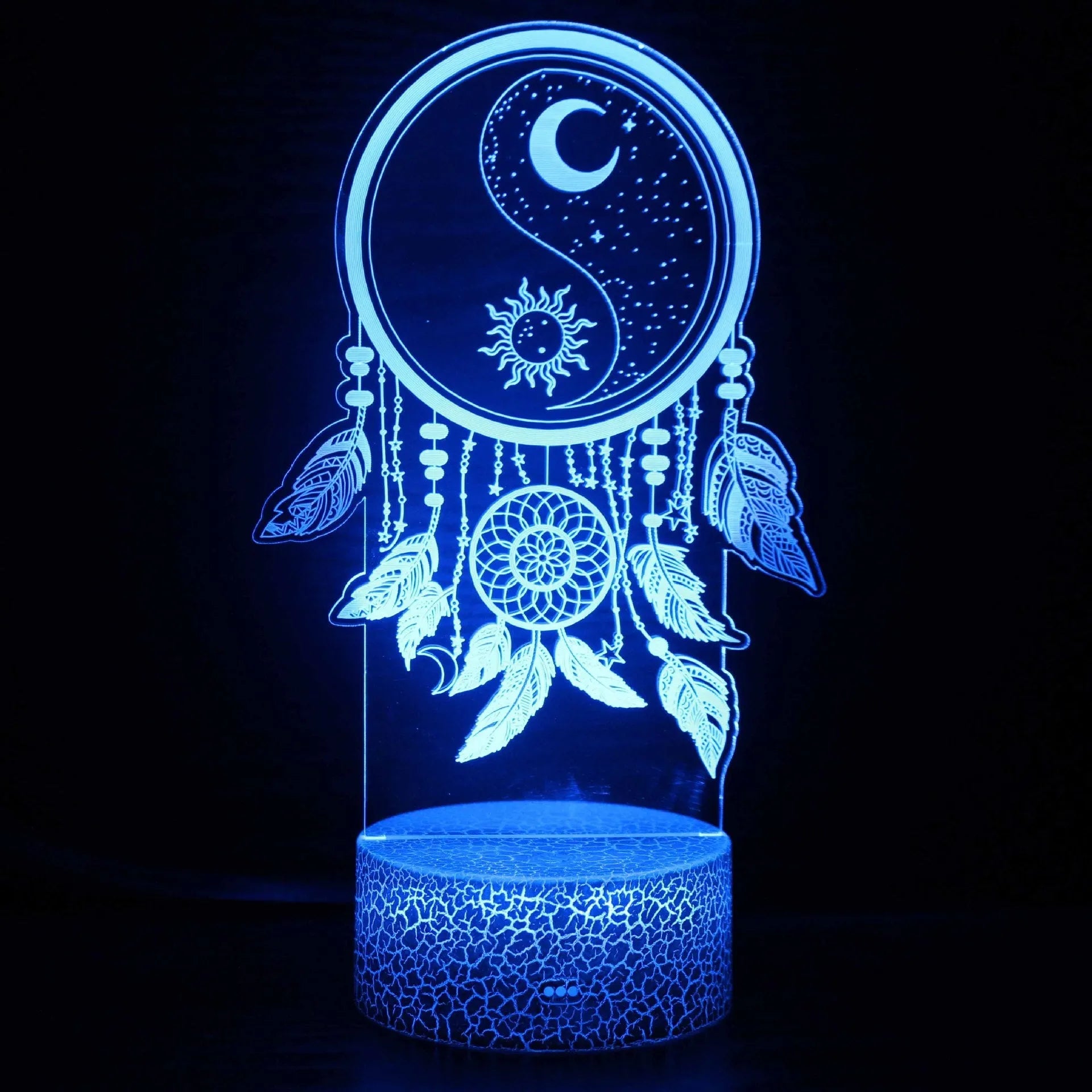 3D small night lamp with LED colourful lighting and black base on bedside table