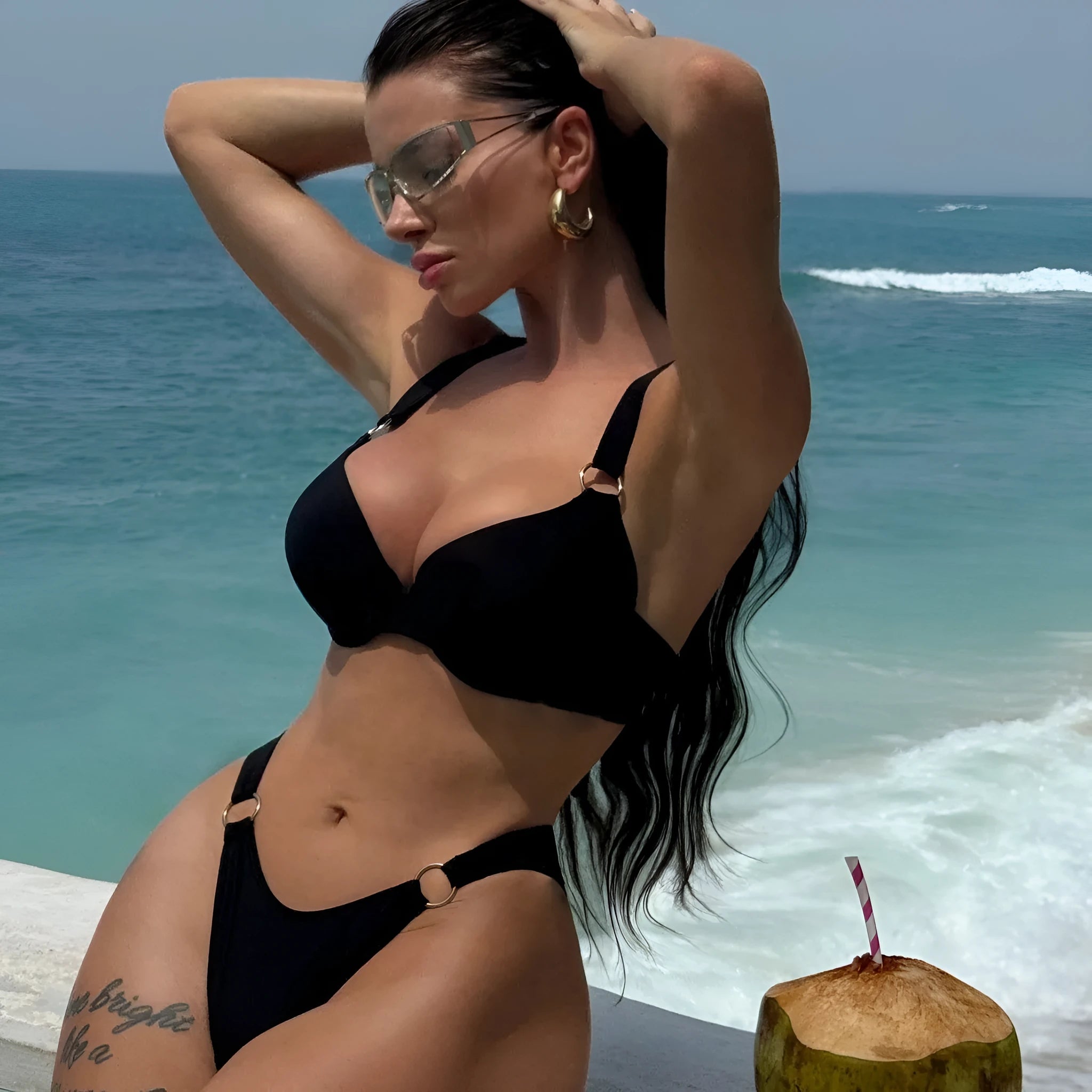 Women's solid black nylon bikini swimsuit set for swimming and wading