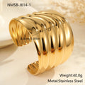 Women's wide fashion bracelet with wave design in gold-plated stainless steel