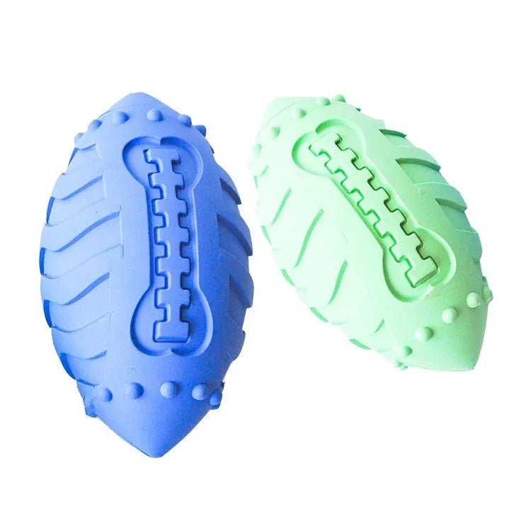 Sapphire blue rugby-shaped rubber dog toy with textured surface for teeth cleaning