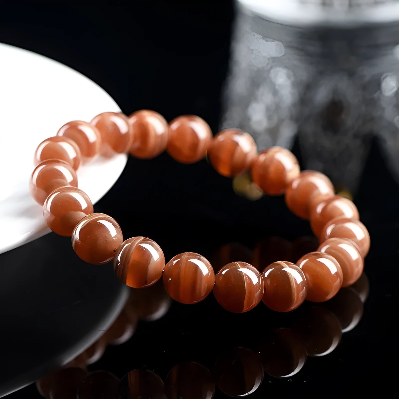 Natural old mine rhodochrosite round beads bracelet from Peru in 6mm or 8mm sizes with Ruyi elements