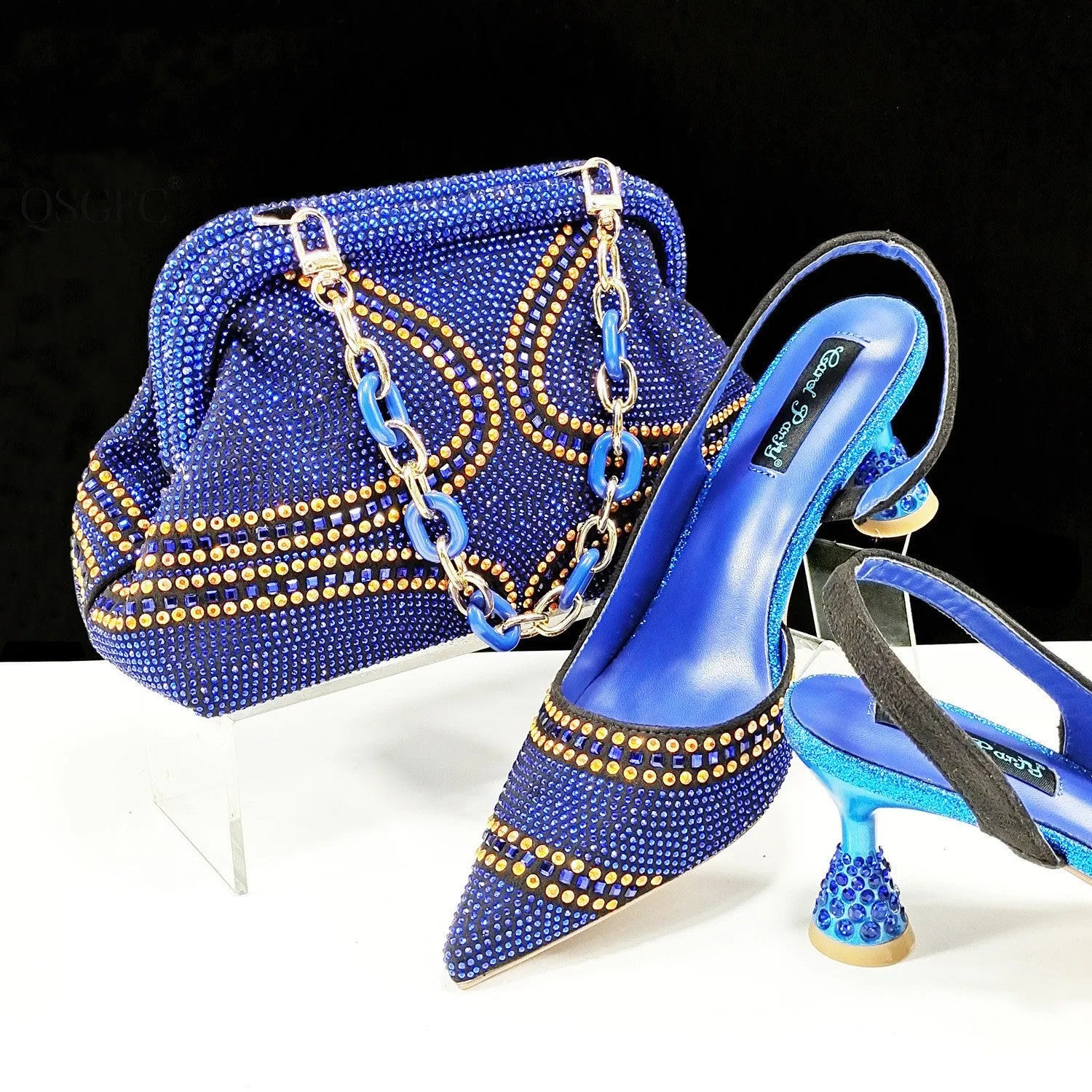 Women's pointed toe high heels with matching small bag, shown in one of eight available colours.