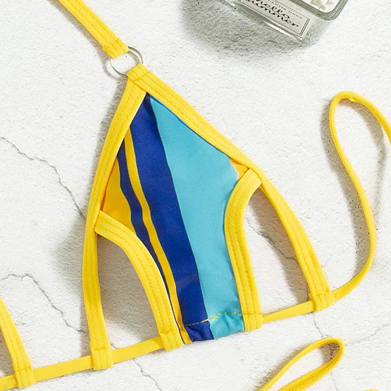Yellow women's split swimsuit with neck-hanging top, hollow backless design, and high waist shorts