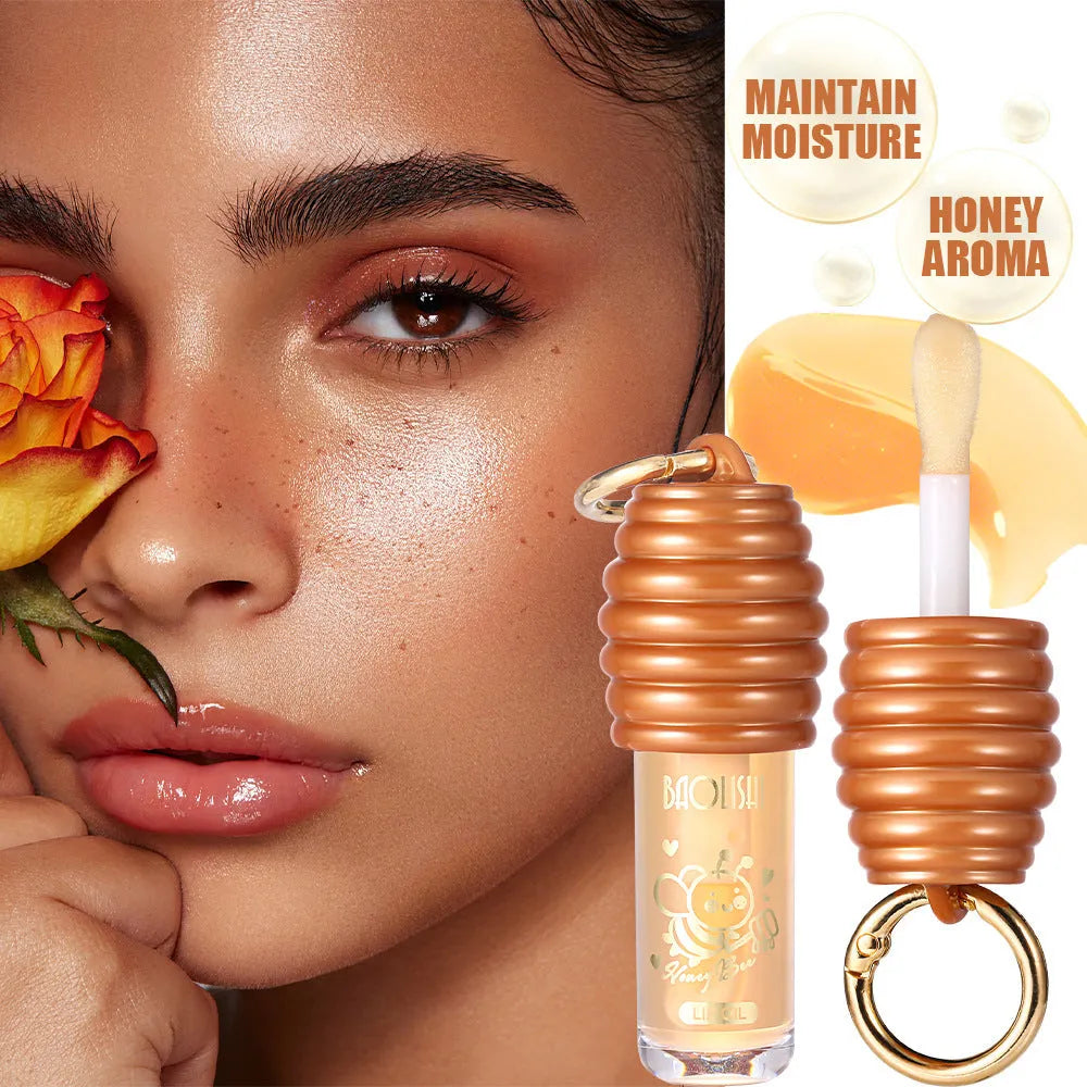Honey lip gloss attached to keychain with pannier bag connector