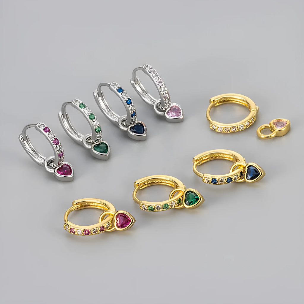 Women's copper earrings with heart-shaped drops and coloured stone accents in gold or white gold tone settings