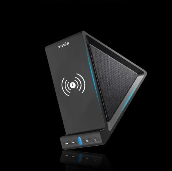 Black multifunctional Bluetooth speaker with integrated phone holder and wireless charging pad showing front and side views.