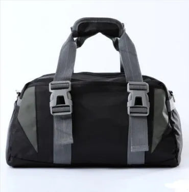 Black nylon yoga gym bag showing medium and large size options next to a yoga mat.