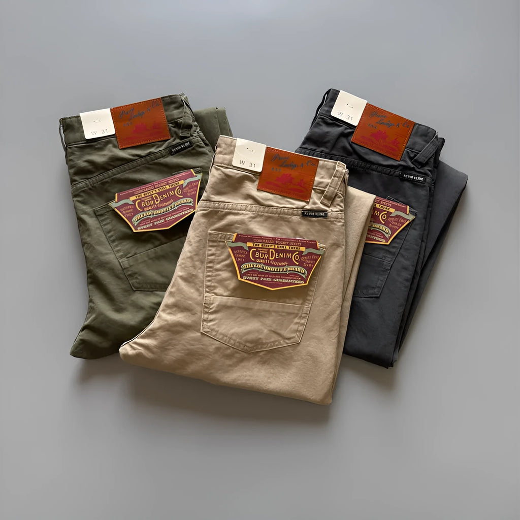 Men's straight-leg cotton trousers in army green shown flat, detailing the five-pocket design and mid-waist fit.