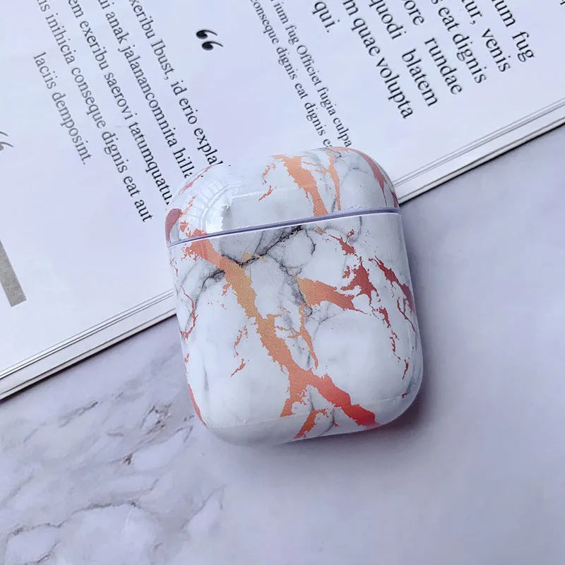 White marble pattern hard protective case for AirPods 1 and AirPods 2 wireless charging box.