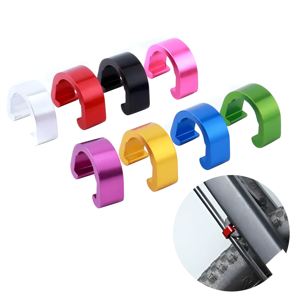 Set of ten small aluminium alloy C-shaped buckles in assorted colours including black, blue, gold, and pink.