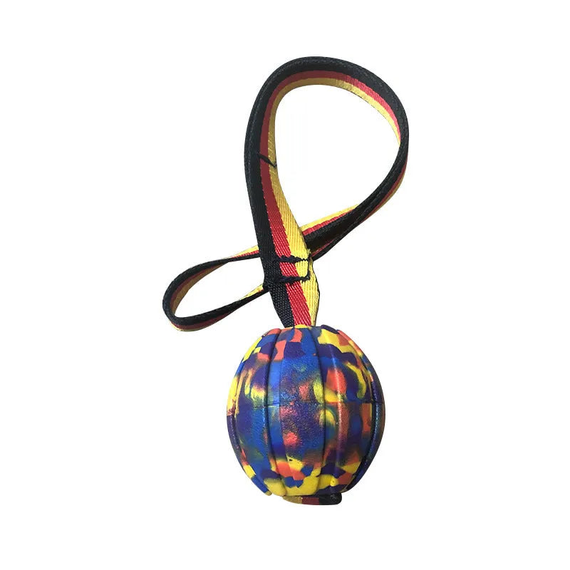 EVA floating pet tetherball toy in yellow and camouflage colours with string attachment