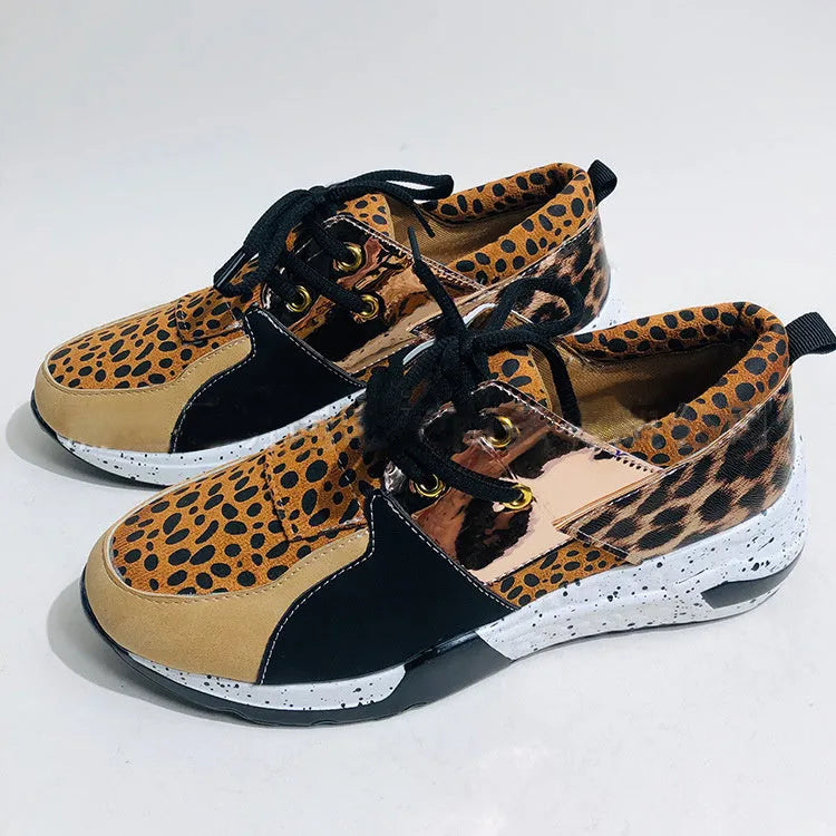Women's casual suede sneakers with wedge heel in black, leopard, panther, pink, and snake pattern colours