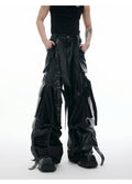 Black loose fit men's retro pants with quilted ribbon detailing and multiple pockets