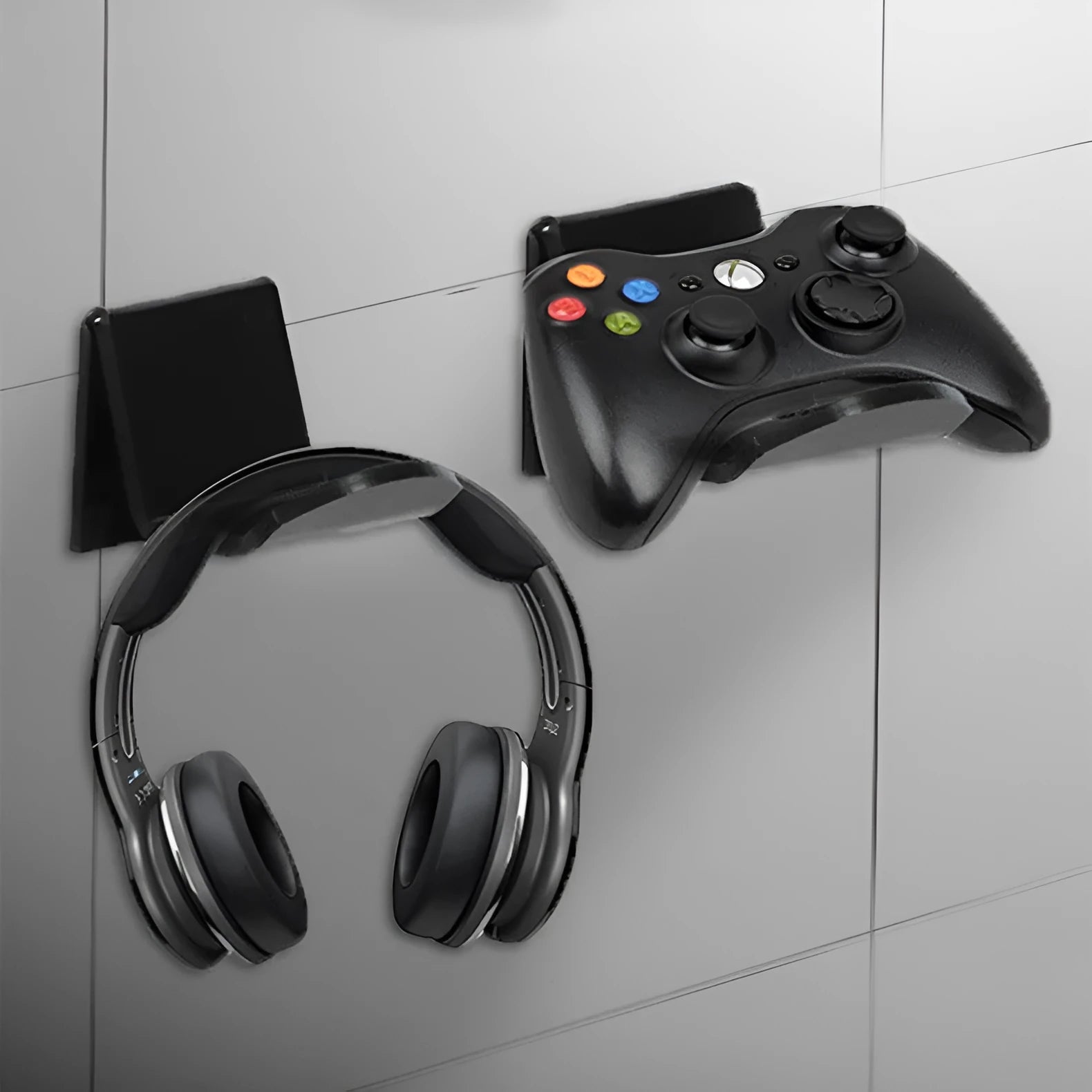 Universal game controller mounting bracket in black colour mounted behind a door