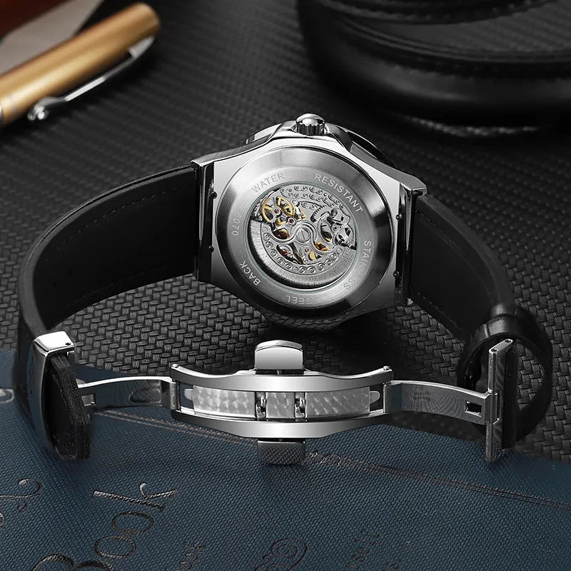 Men's automatic mechanical watch with hollow movement and diamond-studded dial on wrist