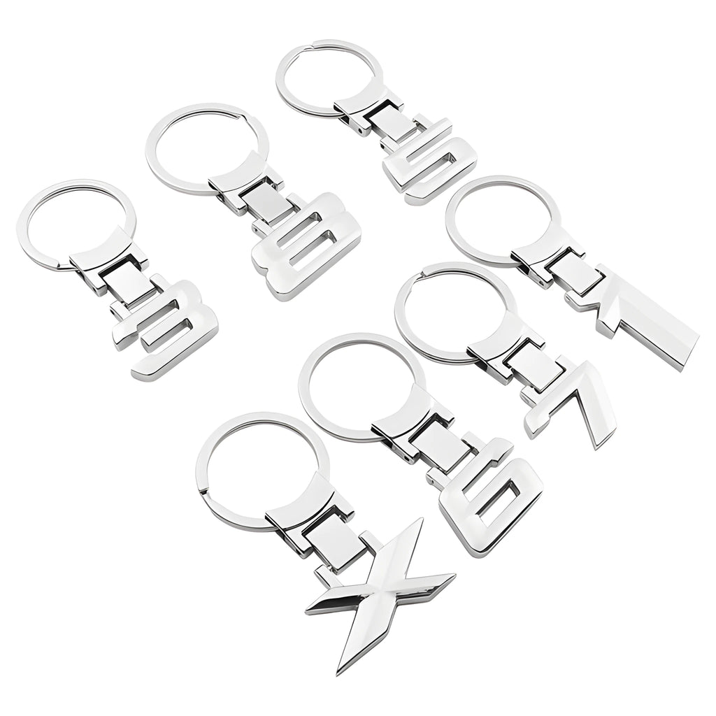 Zinc alloy metal keychain 67mm long on a wooden surface with a set of keys attached