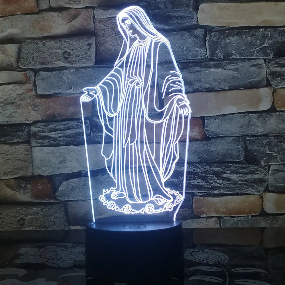 3D LED night light showing illuminated blue dual-ring pattern on acrylic plate with black ABS base.