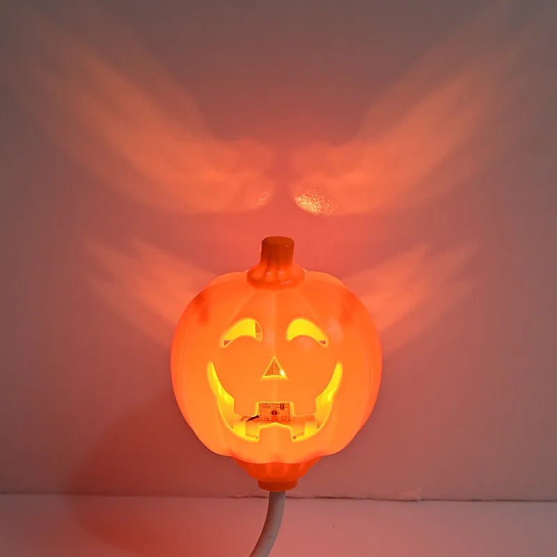 Purple and yellow light USB rechargeable plastic pumpkin lamp for Halloween decoration.