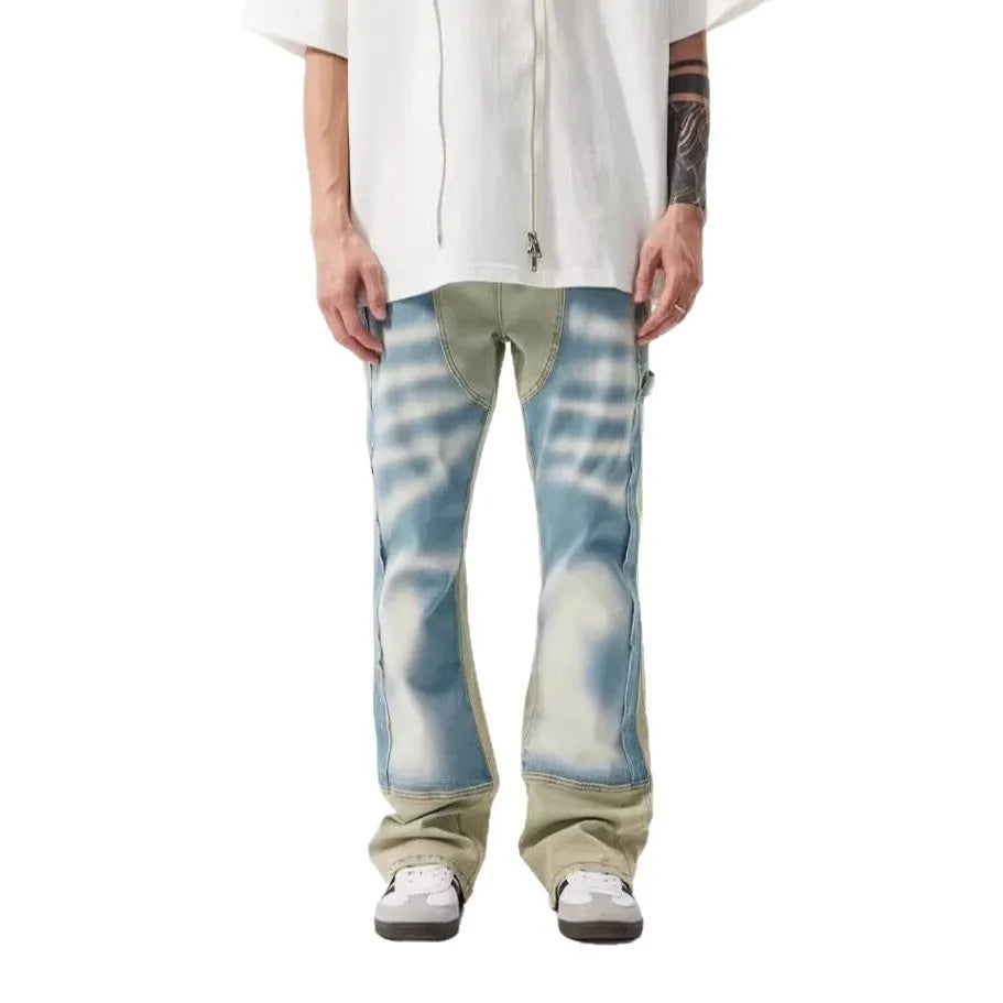 Retro dual-colour patchwork jeans with splash-ink damaged design in yellow and blue polyester denim