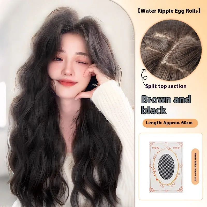 Women's full head wig with long curly artificial hair and side bangs in natural styling