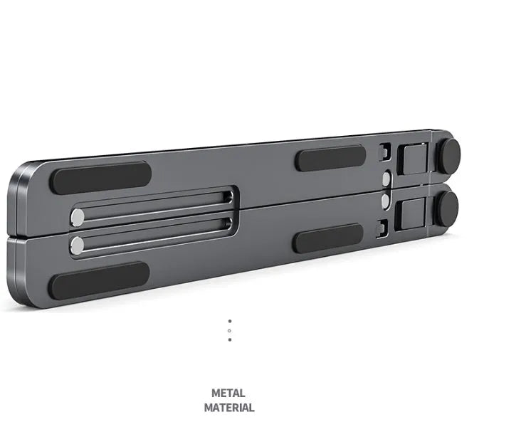 A folded silver aluminium laptop stand next to an open laptop, showing its thin profile and adjustable angle mechanism.