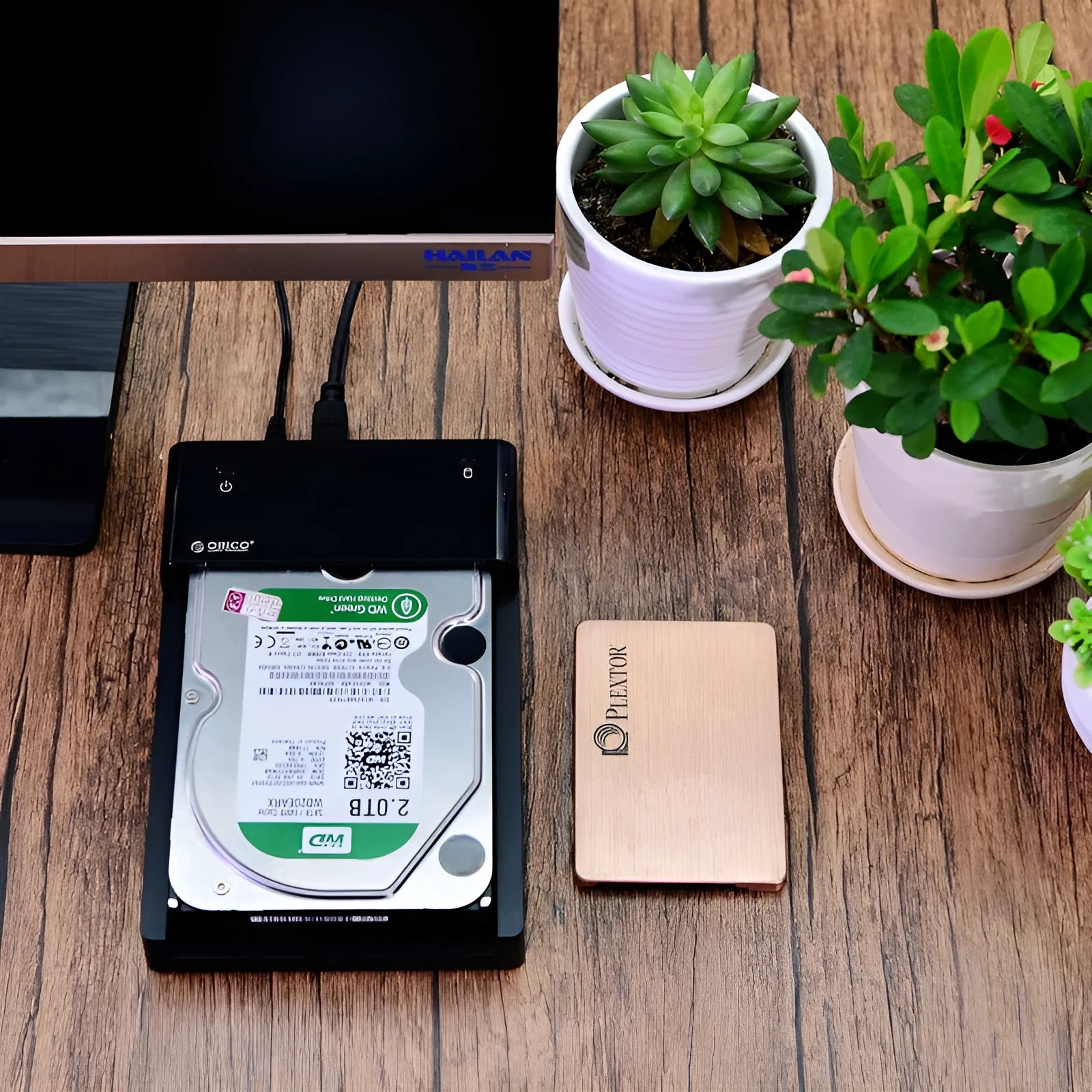 Black universal hard drive enclosure for 2.5 inch and 3.5 inch SATA drives with data cable