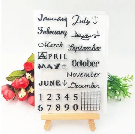 Vintage icon seal calendar stamp in transparent silicone on a crafting surface.
