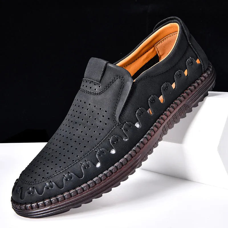 Men's brown slip-on casual shoes with round toe, flat heel, and visible sewing line details.