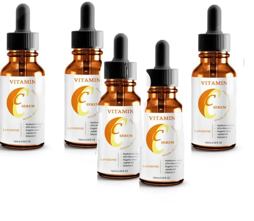 Bottle of Vitamin C and Hyaluronic Acid facial serum for anti-aging and skin brightening.