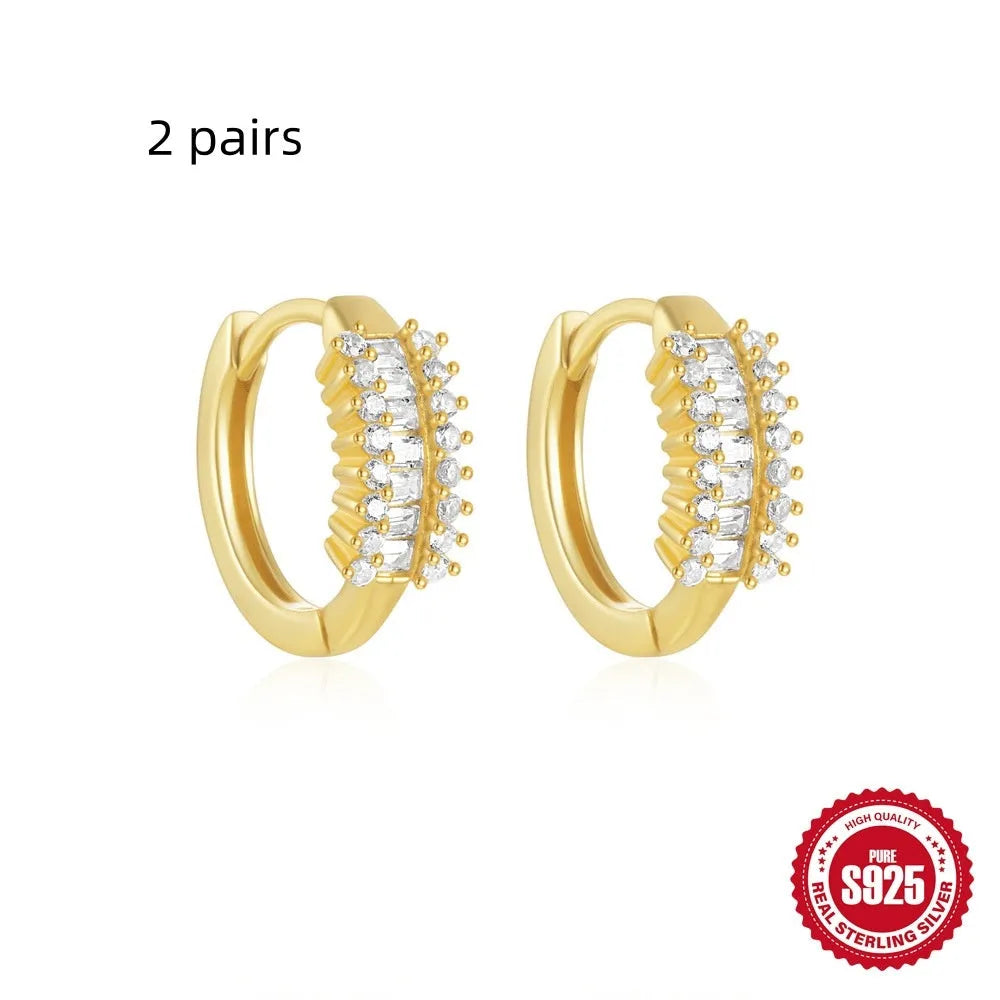 Sterling silver geometric stud earrings with diamond detailing in gold or silver finish
