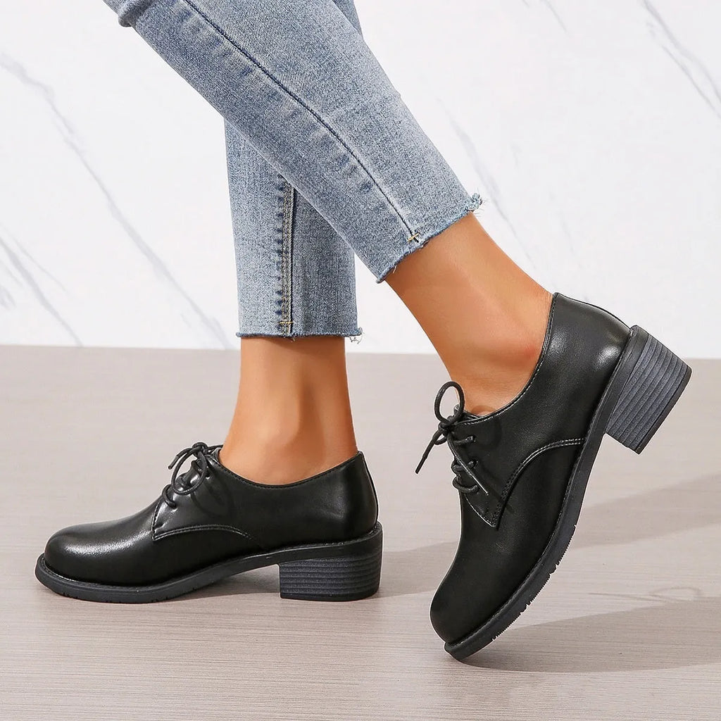 Black women's work shoes with chunky heel and soft rubber sole