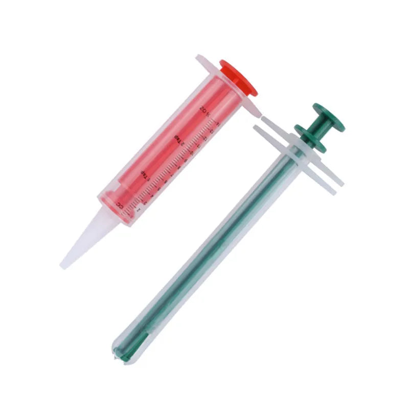 Two silicone pet pill shooter syringes, one 15cm and one 11.5cm, for feeding medication to cats and dogs.