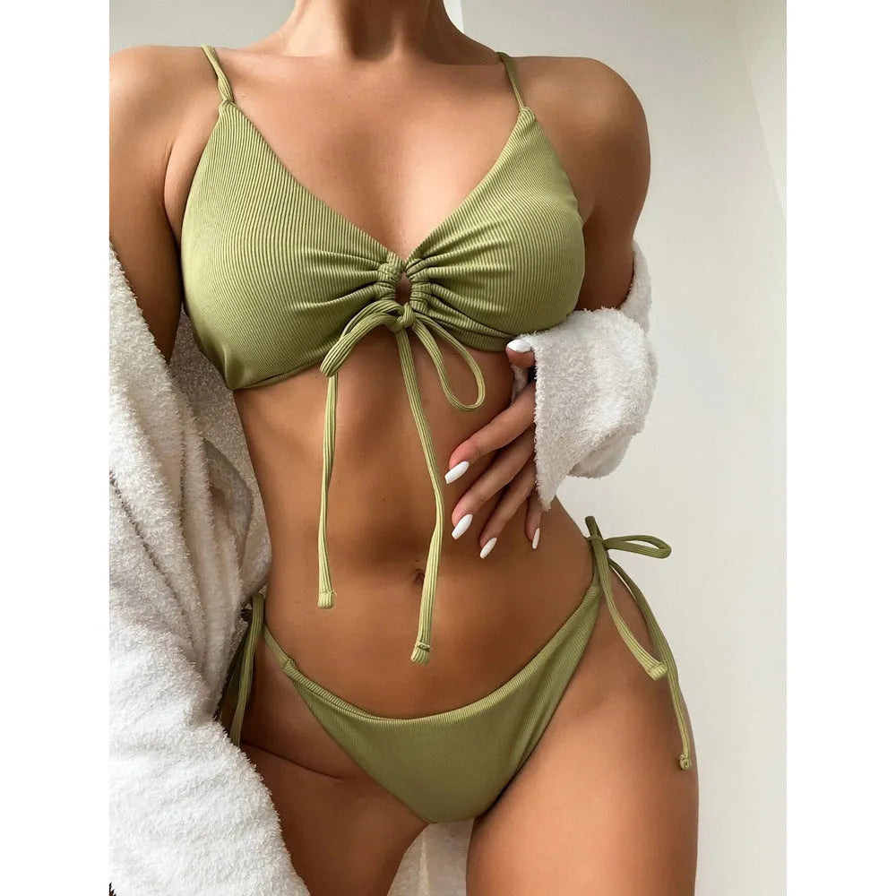 Women's solid colour bikini with drawstring ties on bra and briefs, shown in army green.