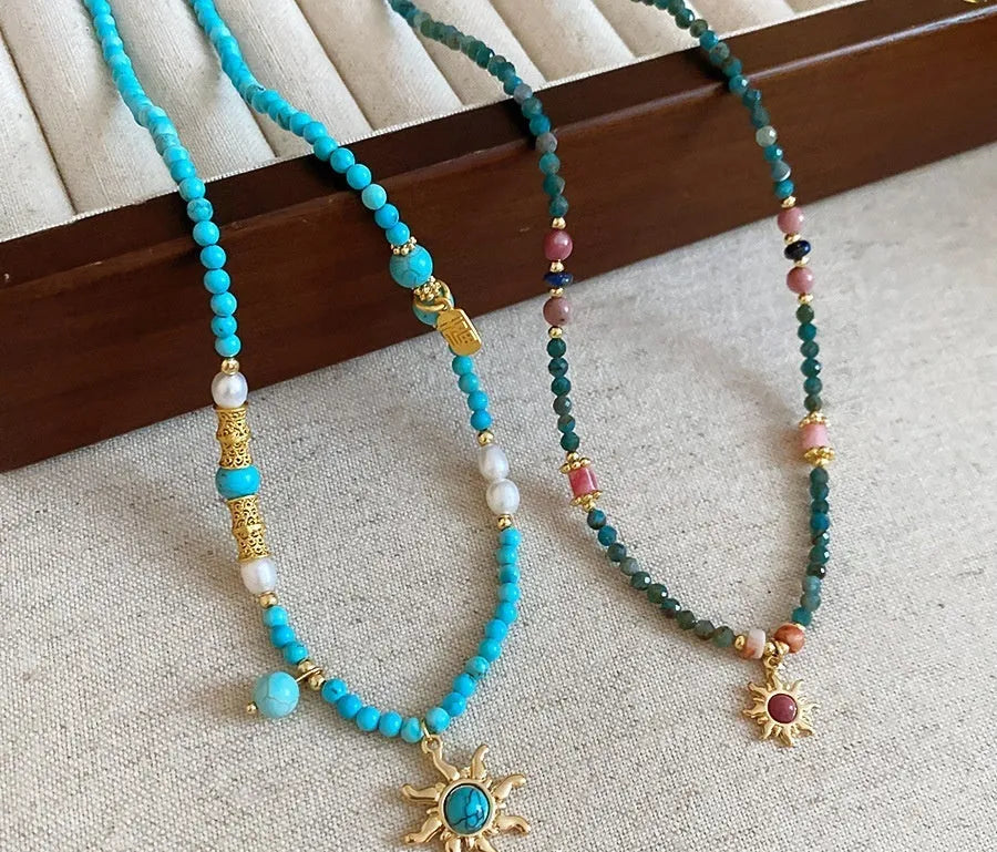 Stone freshwater pearl sun necklace with French royal style pendant on adjustable clavicle chain