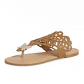Women's black slip-on sandals with rhinestone details and a flip-toe design