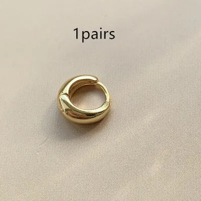 Women's geometric water drop earrings in gold or silver with retro minimalist circular design