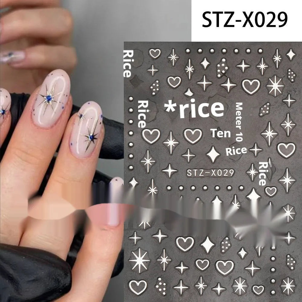 Plastic sheet of black, silver, and cartoon design nail art stickers for DIY manicures.