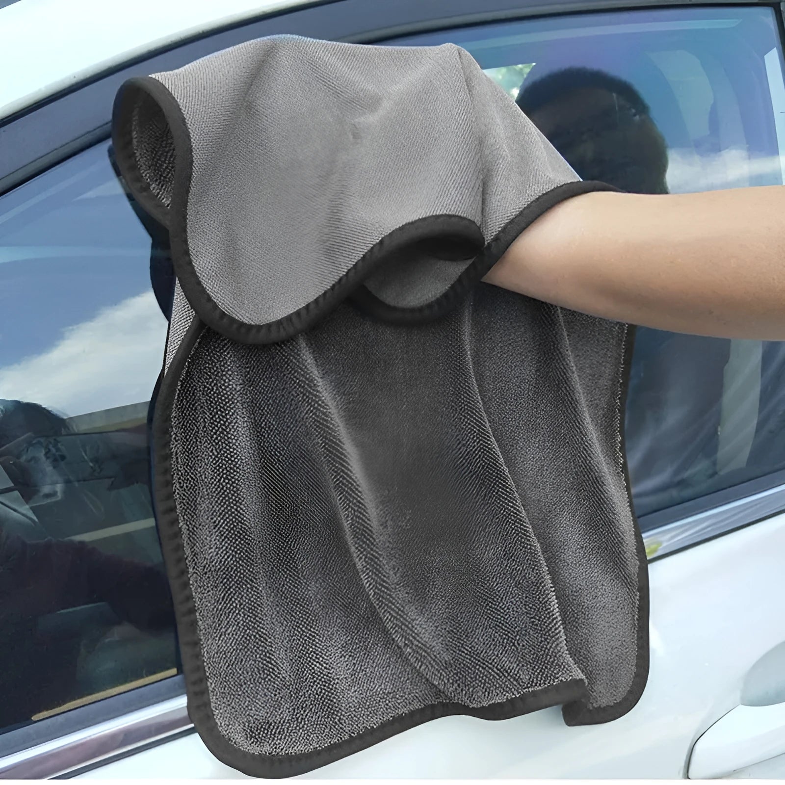 Grey microfiber car drying towel laid flat showing 40x40cm size.