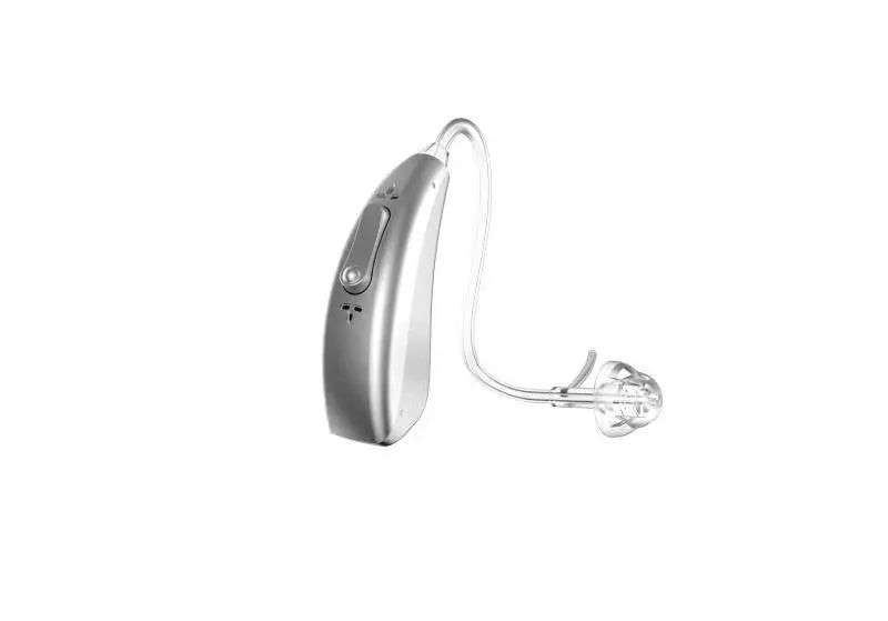 Invisible wireless hearing aid and its USB charging case on a table.